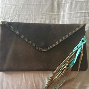 Genuine Leather
Brown Clutch Boho
Tassel Envelope
Style Wristlet